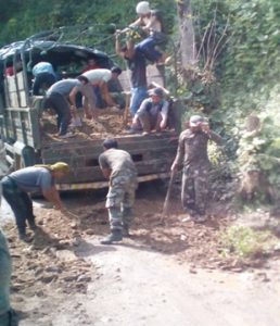 Troops of 5 Assam Rifles undertaking the road maintenance work between Lumami and Akuluto town under Zunheboto district.
