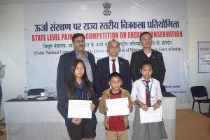FP Solo, centre, shares a photograph with officials and the winners of the state-level painting competition, which was themed on energy conservation, that was conducted on November 9 in Kohima town.