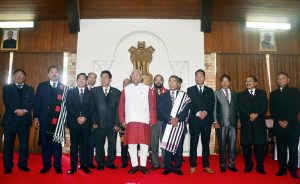 Newly elected Nagaland Chief Minister Dr. Shurhozelie Liezietsu, Nagaland Governor Padmanabha Acharya and alone with his Cabinet Minister during the sworn in ceremony at Kohima, Nagaland on Wednesday, 22 February 2017. Photo by Caisii Mao