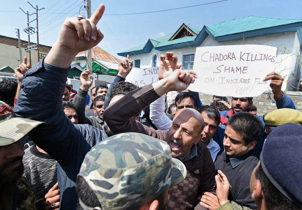 Srinagar: Police stop Awami Itihaad Party (AIP) president and Independent MLA Abdul Rashid Sheikh and his supporters who were holding a protest in Srinagar on Wednesday against the killing of three civilians in Chadoora Budgam encounter. PTI Photo  (PTI3_29_2017_000073B)
