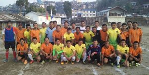 Players of MRH FC (orange) and Amur Falcon FC (yellow) before the match at D Khel ground, Kohima on Friday. 