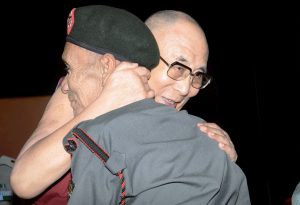 Guwahati: Tibetan spiritual leader Dalai Lama with Naren Chandra Das, a retired havildar of 5 Assam Rifles during Namami Brahmaputra festival in Guwahati on Sunday. Das is a lone survivor of the seven Indian personnel who received Dalai Lama on the Indian soil when he escaped from Tibet in 1959. PTI Photo(PTI4_2_2017_000117B)