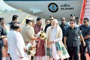 Prime Minister Narendra Modi being welcomed by party leaders upon his arrival at Biju Patnaik Airport, in Bhubaneswar on Saturday. 