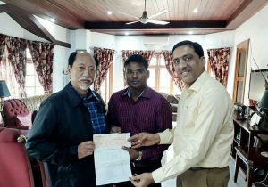 DC and President IRCS Dimapur Sushil Kumar Patel and Chairman IRCS Dimapur handing over the cheque to the Chief Minister Nagaland Neiphiu Rio on 23rd October 2018