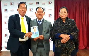 ANCHOR Rev. Dr. Anjo Keikung with T. Imdong Phom his wife Akala during the release of Trailblazer a biography of T. Imdong Phom