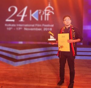 Director Ashok Veilou with the Best Short Film award for his “Look At The Sky” at the 24th Kolkata International Film Festival Kiff on Saturday.
