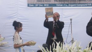 Chairman CVD Razouvotuo Chatsu unveiling the Jubilee Book