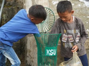 Students collecting trash
