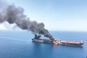 Two tankers catch fire after suspected Gulf of Oman attacks