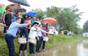 agriculture minister V Hangkhalian led department officials participating in the seed sowing programme in the outskirt of Imphal after seasonal rainfall arrives in the state on thursday 2
