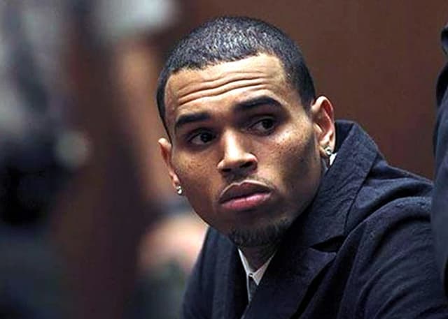 Chris Brown ordered to pay $13 million to former housekeeper after she was attacked by his dog