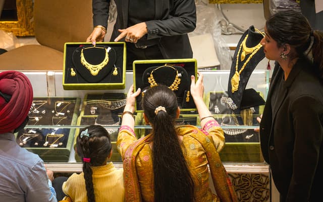 Gold, silver prices fall up to 2 pc amid stronger dollar, Fed rate hike concerns