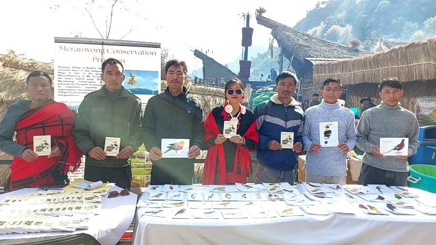 Thanamir villagers bring conservation story to Hornbill Festival with launch of new bird guide