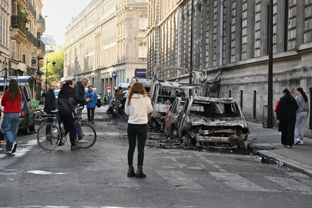 Paris police report 855 arrests after violent clashes, looting during protests