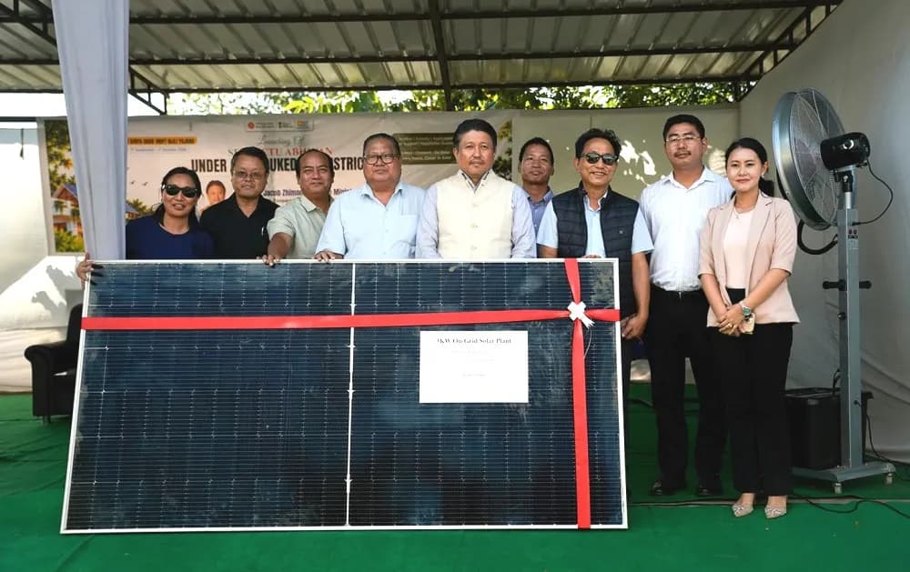 Jacob Zhimomi handing over a solar panel system to the Sovima Village Council in Chümoukedima on Wednesday.